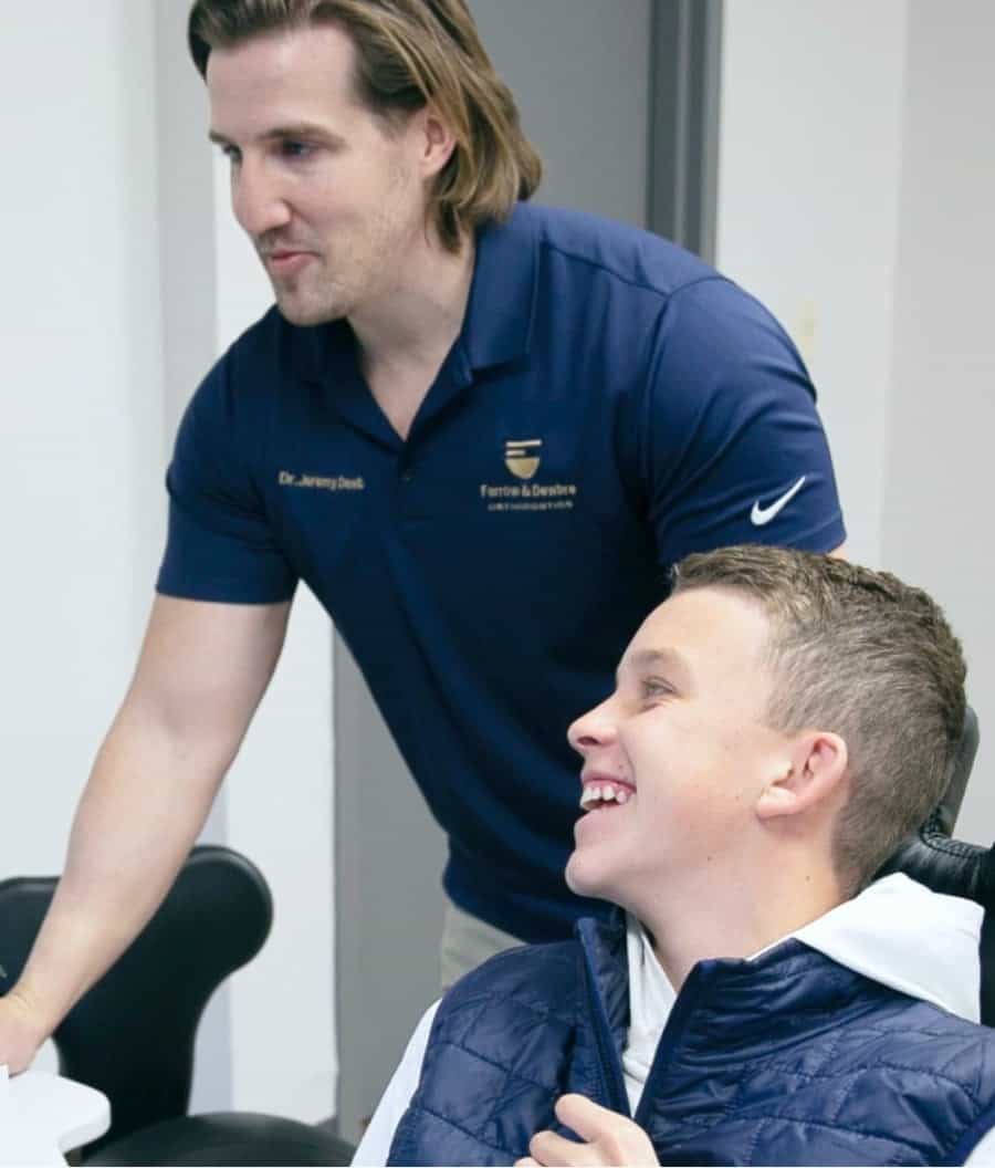 Dr. and patient smiling during visit